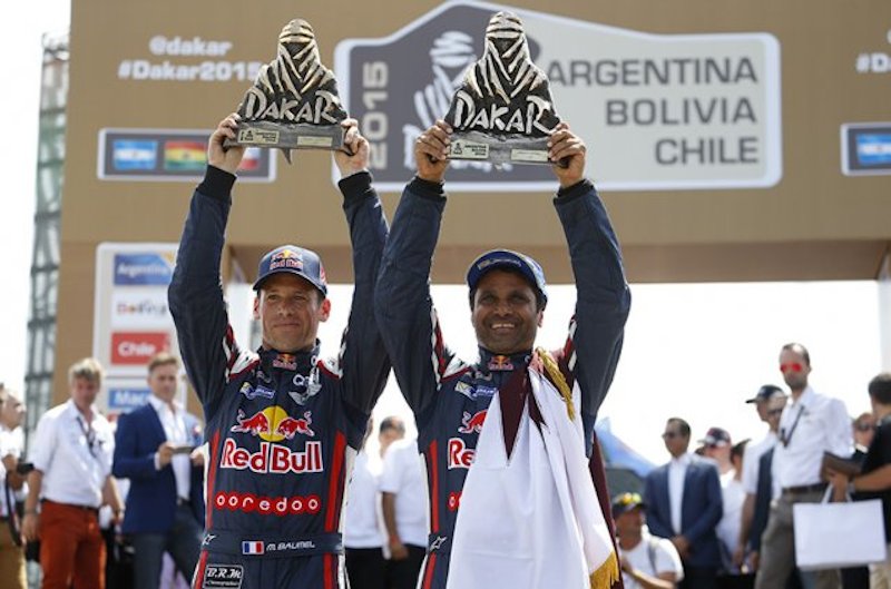 Al-Attiyah (right) and co-pilot Mathieu Baumel of France.