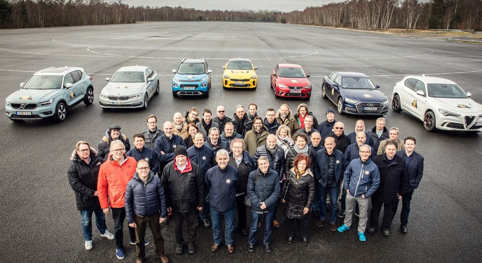 The automotive jurors settling the final scores of the seven finalists in Mortefontaine, France.