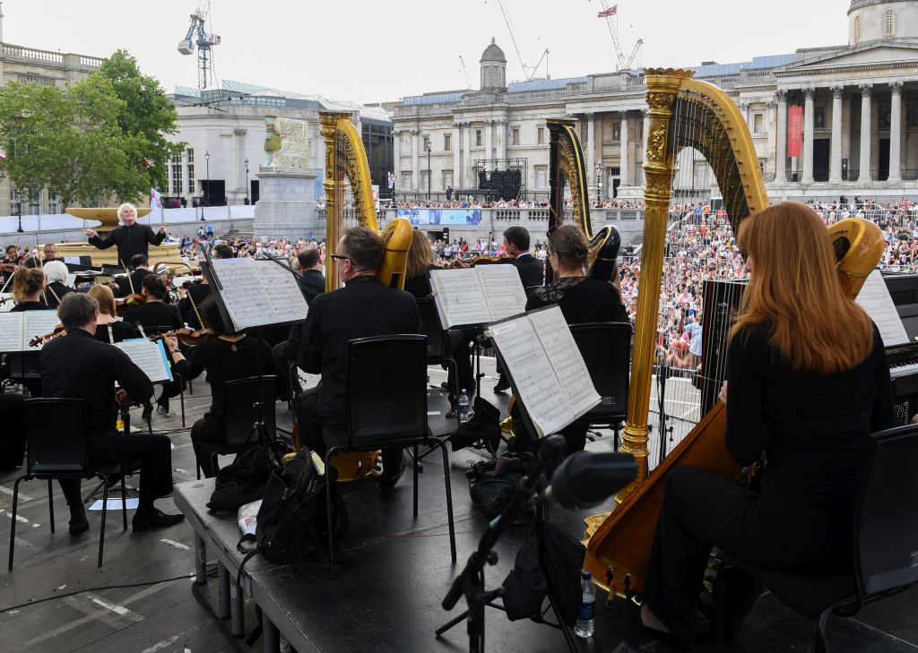 Sir Simon Rattle conducts the London Symphony Orchestra with 50 LSO On Track young musicians from across East London and Guildhall School musicians at BMW Classics in Trafalgar Square, London. PRESS ASSOCIATION Photo. Picture date: Sunday July 1, 2018. Photo credit should read: Doug Peters/PA Wire