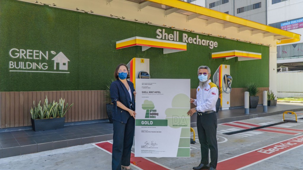 Green Building Index (GBI) Accreditation Panel chairman Serina Hijjas (left) and Shairan showing the mock GBI-certification. 