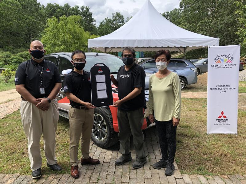 Shinnishi (second from left) handing over the Triton to Dignity Farm School co-founder Pastor Elisha Satvinder. With them are MMM COO Ilham Helmi (left) and Dignity Farm School CEO and co-founder Petrina Shee Satvinder (right).