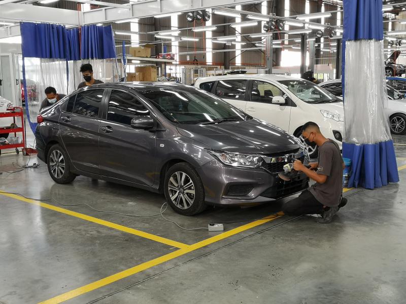 Cars under going detailing.