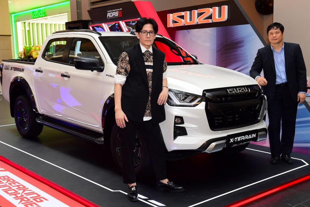 Sogo (right) and KL Fashion Week founder Andrew Tan with the D-Max X-Terrain. 