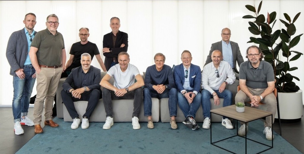 Blume (seated. second from left) posing with the design heads of VW's various car brands.