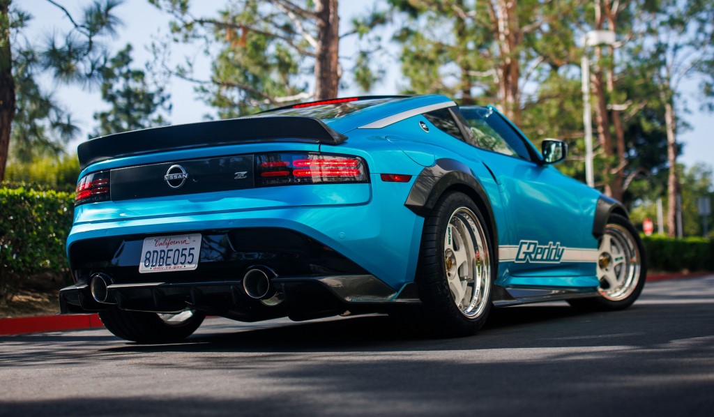 Lower angled rear view of the Nissan Z Kaze Concept parked on an asphalt road